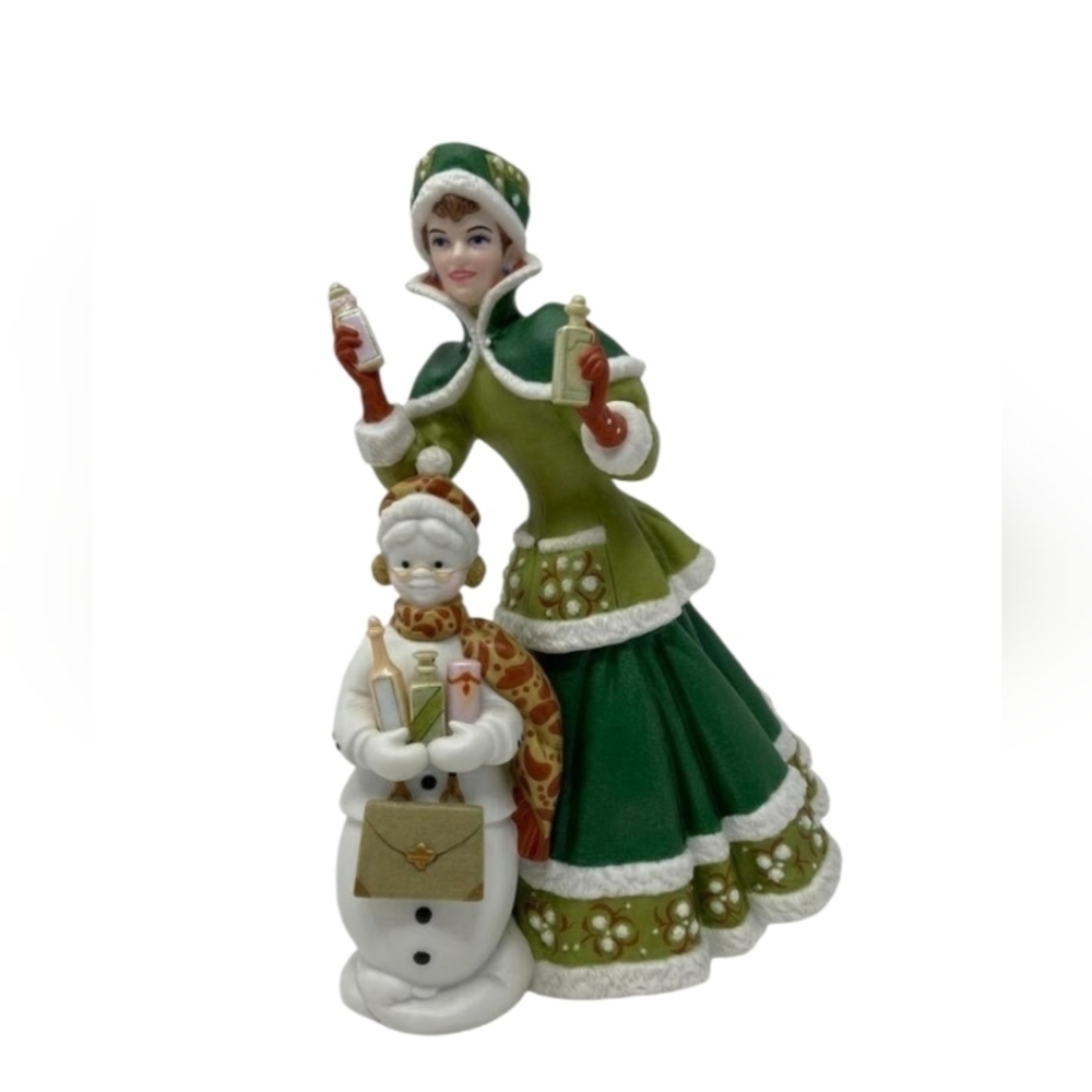 Avon Mrs. Albee President's club Award Holiday figurine from 2003